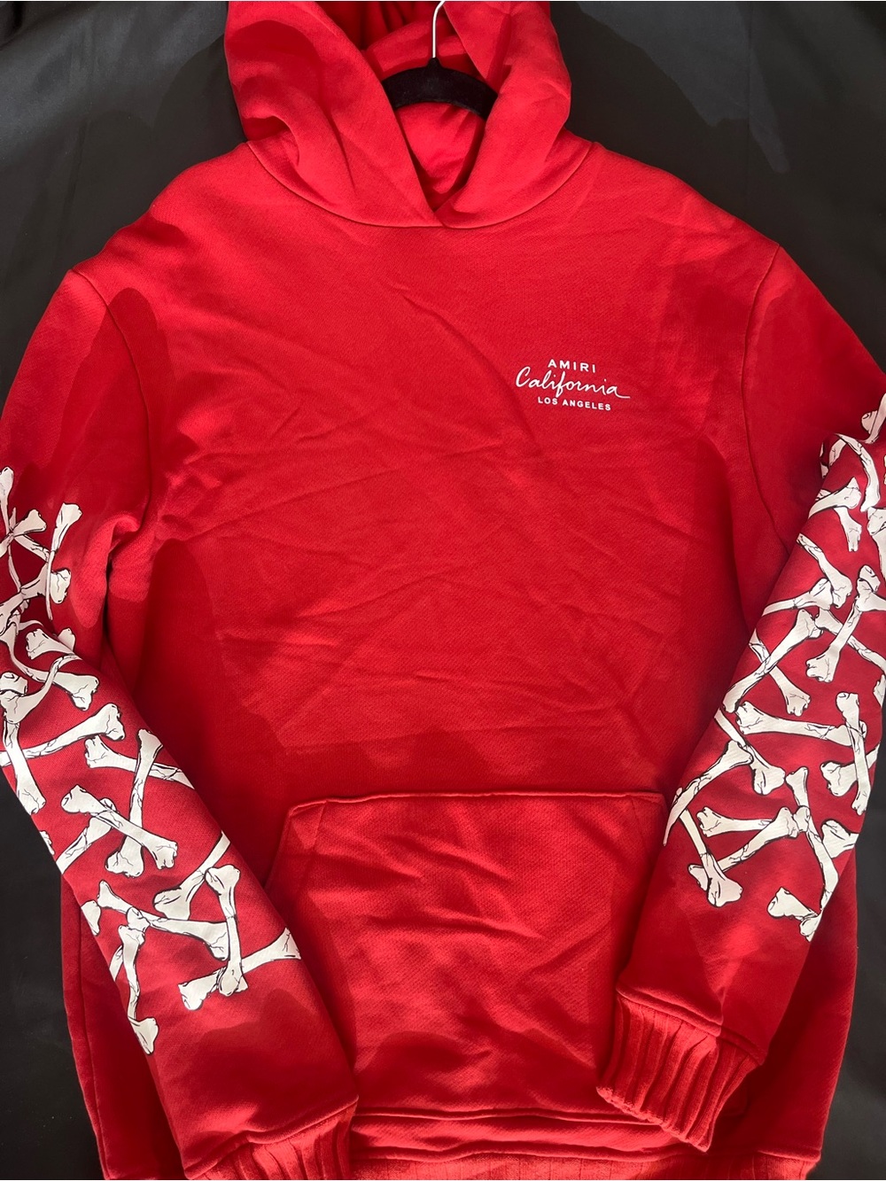AMIRI Red Crewneck Sweatshirt with White Bone Sleeve Graphics
